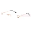 Cartier Singature C DE Rimless Titanium Eyeglasses CT0563O (2)